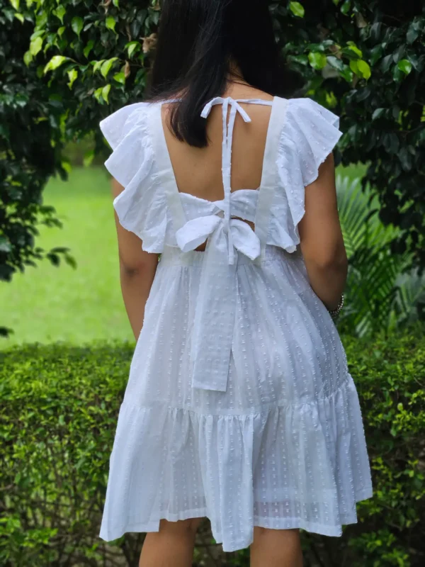 white dobby cotton mini dress with tie back detail